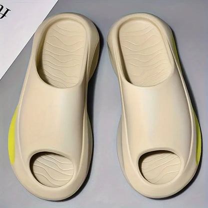 a pair of white slippers sitting on top of a table